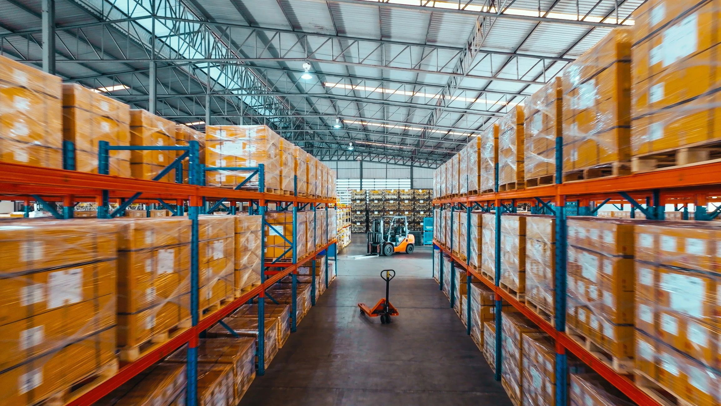Warehouse shelves with packaged goods for logistics and procurement