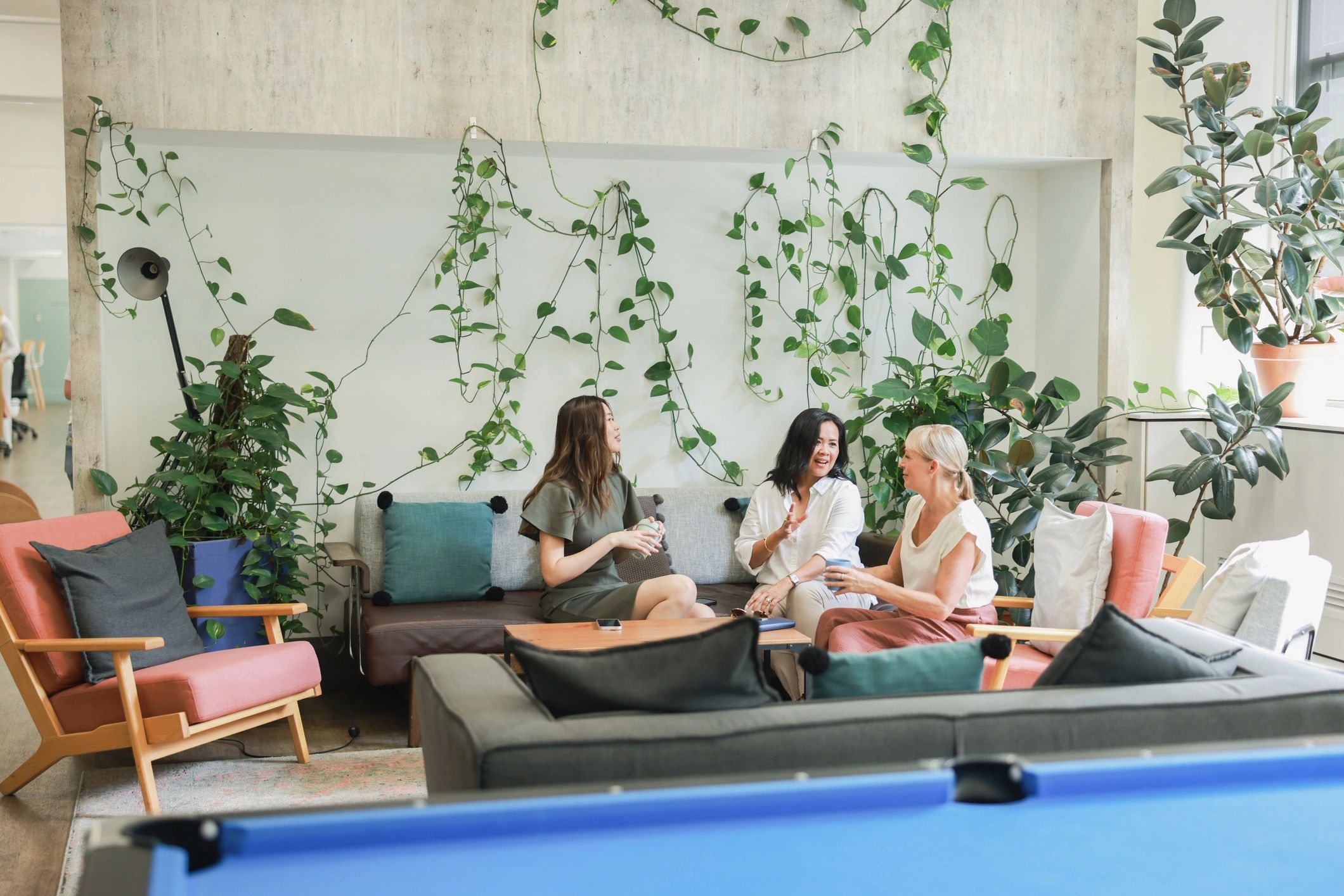 Schilling Services team meeting in a modern office
