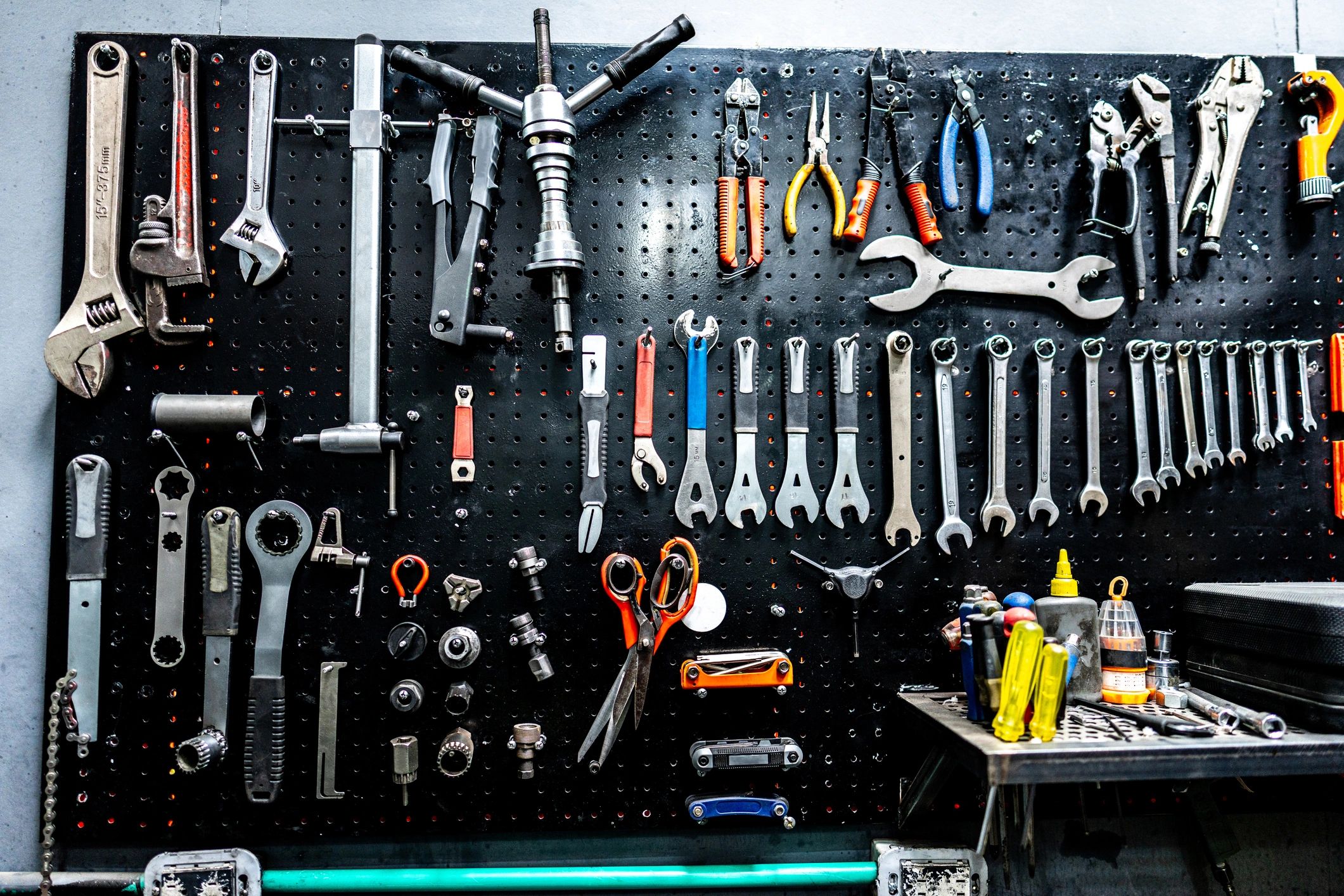Tool board with organised tools in an industrial workspace