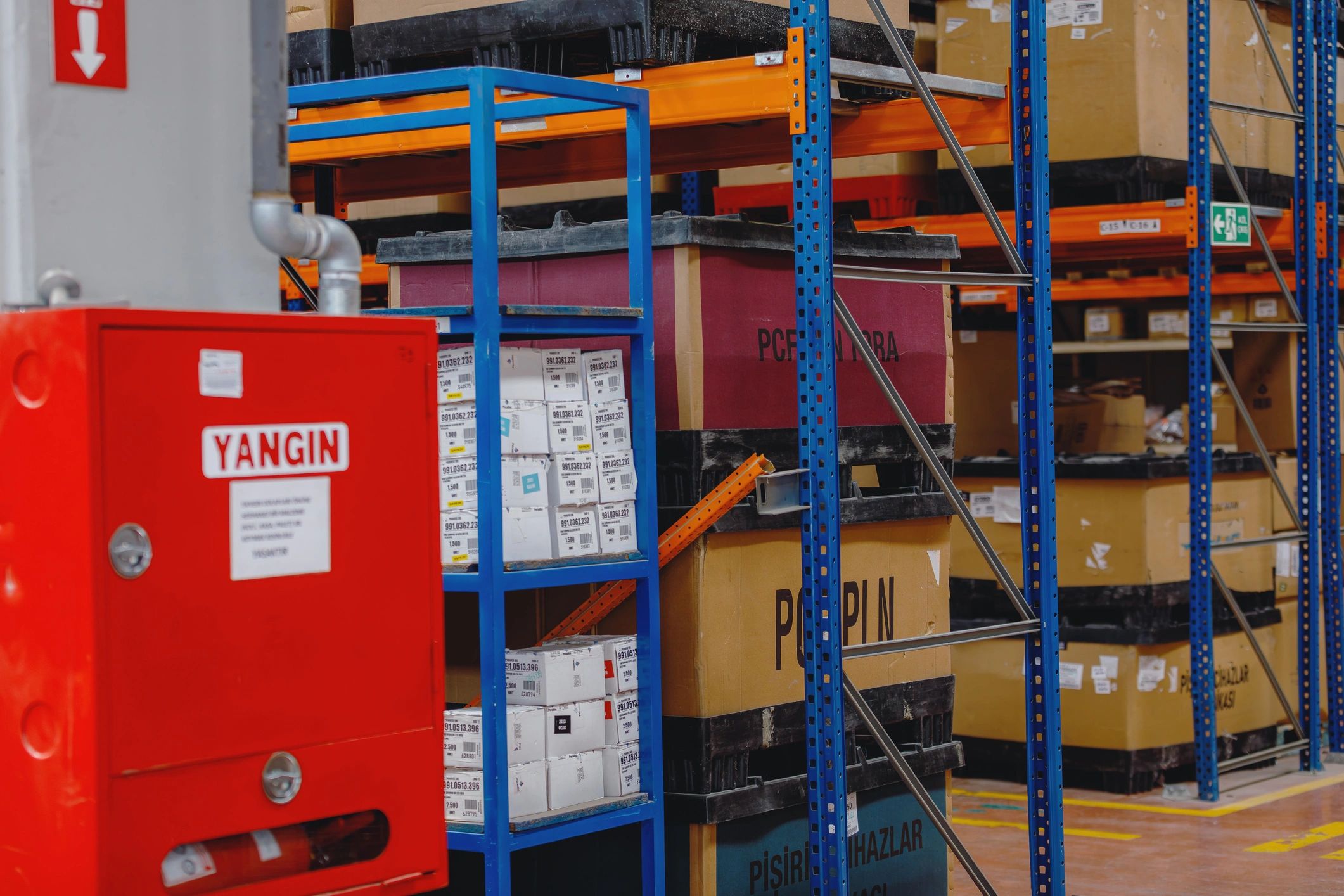 Fire safety cabinet and organised storage in an industrial warehouse